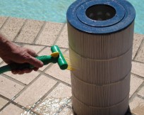 Aqua Comb pool and spa filter cleaning device.