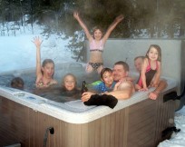 Winter fun in the holiday hot tub for the whole family.